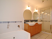 Large Bathroom with separate shower and corner spa bath