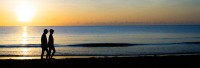 Stroll along the beach at Sunrise