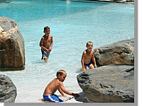 Children Love the Swimming pool with the Beach