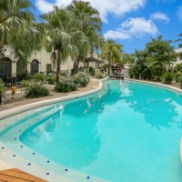 1 of 4 Tropical Swimming Pools | Mango Lagoon Resort & Spa Palm Cove