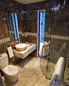 Marble Ensuite Bathroom at One Bedroom Ocean Suite Bedroom at Fitzroy Island Resort 