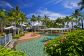 Relax by the Resort Swimming Pool as you take in the ocean views over Trinity Beach Relax by the Resort Swimming Pool as you take in the ocean views over Trinity Beach