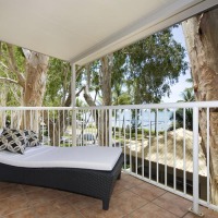 Relax on your Day Bed overlooking Palm Cove from your Beachfront Balcony - Paradise on the Beach Palm Cove