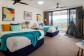2nd Bedroom with 2 x Double Beds, bathroom, kitchenette & balcony - Cairns Esplanade Accommodation 