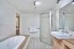 414 Private Apartment Palm Cove Main Bathroom with Spa Bath & Shower