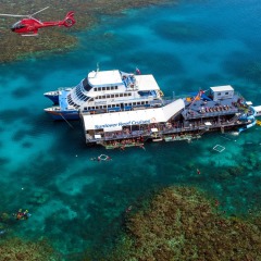 Aerial view of the pontoon and helicopter on the Great Barrier Reef