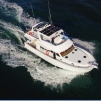 Port Douglas Charter Boat - Aerial view private charter boat Port Douglas, Great Barrier Reef, Australia 