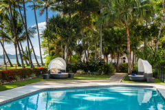Palm Cove Beachfront Accommodation - Swimming Pool under the Palm trees on Palm Cove Beach 