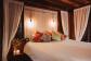 Canopy Treehouse Accommodation  Bower House Master Bedroom - Rainforest Treehouse Cairns' Nature Getaway