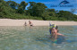 Children snorkelling at Green Island on the Great Barrier Reef in Queensland Australia