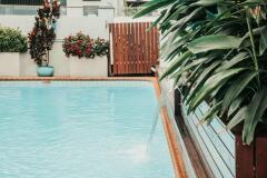 Enjoy a dip in the pool -  Cairns Queens Court Holiday Accommodation