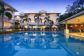 Enjoy a refreshing dip in the Swimming Pool (Heated in Winter) - Cayman Villas Luxury Port Douglas Holiday Apartments