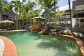 Enjoy a refreshing swim in the tropical Swimming Pool & Spa - Paradise On the Beach Palm Cove