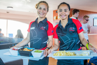 Friendly Reef Tour Staff Serving Lunch - Cairns Snorkel Tour