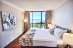 Ocean View Suite Bedroom  - Cairns Plaza Hotel