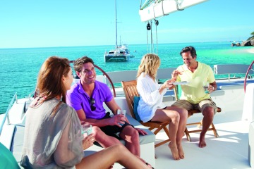 Join family and friends on a private boat charter in Cairns