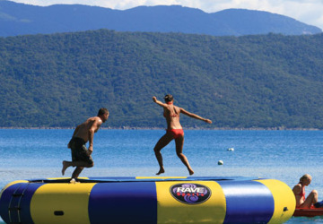 Jump on the in-water trampoline on Fitzroy Island on the Great Barrier Reef 