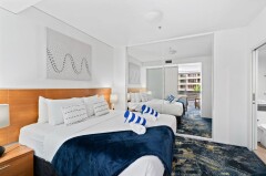 King Bedroom - One Bedroom Apartment - Harbour Lights 405