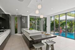 Kitchen with Pool views | Palm Cove Holiday Home