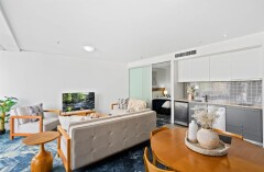 Kitchenette & open plan living and dining - Harbour Lights 405