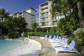 Large Lagoon Swimming Pool with Swim up Bar, Sun Beds and tropical gardens - Novotel Cairns Oasis Resort