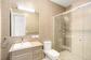 Modern bathroom with bathtub and shower | Palm Cove Holiday Home