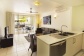 Port Douglas Resorts - Apartment Kitchen and Living Areas opening out to Patio | Port Douglas Apartments