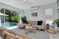 Living Area with views of the Pool - Palm Cove Holiday Home