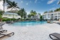 Palm Cove Private Beach Club Apartments with Large Resort Swimming Pool, Swim Up Pool Bar, Formal Pool & Spa.