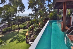 Port Douglas Luxury Beachfront Holiday House with Infinity Lap Pool overlooking beach and walking distance to Markets and Restaurants.
