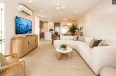 Relax in the spacious living area - Palm Cove Beachfront Suite  
