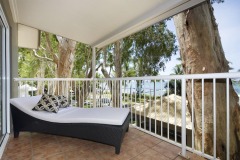 Relax on your Day Bed overlooking Palm Cove from your Beachfront Balcony - Paradise on the Beach Palm Cove