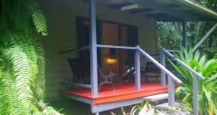 Relax on your own balcony at Heritage Lodge Spa Daintree