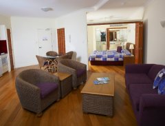 Resort rooms have Spacious Living Area with wooden floors