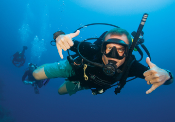 Scuba Diver Enjoying our Great Barrier Reef tour from Cairns