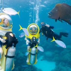 Outer Reef Trip Cairns - Scuba Doo underwater motorbikes on the Great Barrier Reef in Cairns