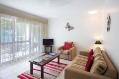Spacious living areas with sofa bed within the self contained apartment | Palm Cove Accommodation
