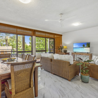 Tranquil Holiday Apartment open plan dining and lounge - great Palm Cove holiday apartments for families | Palm Cove Accommodation