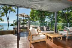 Enjoy the ocean breezes in the Alfresco Lounge - Trinity Beach Oceanview Holiday Home 