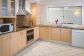 Two Bedroom Deluxe Apartment Kitchen - The Lakes Resort Cairns