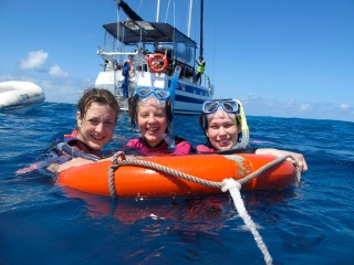 Snorkellers on safety ring | Unlimited Snorkeling | 2 Day 1 Night Great Barrier Reef Trip