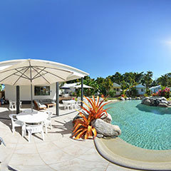 View of a swimming pool in a Port Douglas Private Holiday Home
